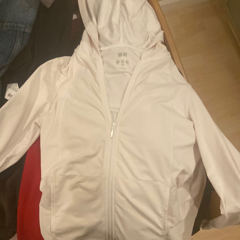 Thin white windbreaker